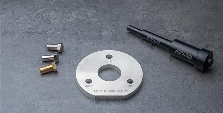 Grabado láser integrado para mejorar la producción de piezas torneadas CNC